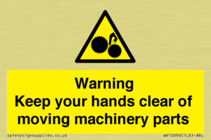 Warning - Keep your hands clear of moving machinery parts
